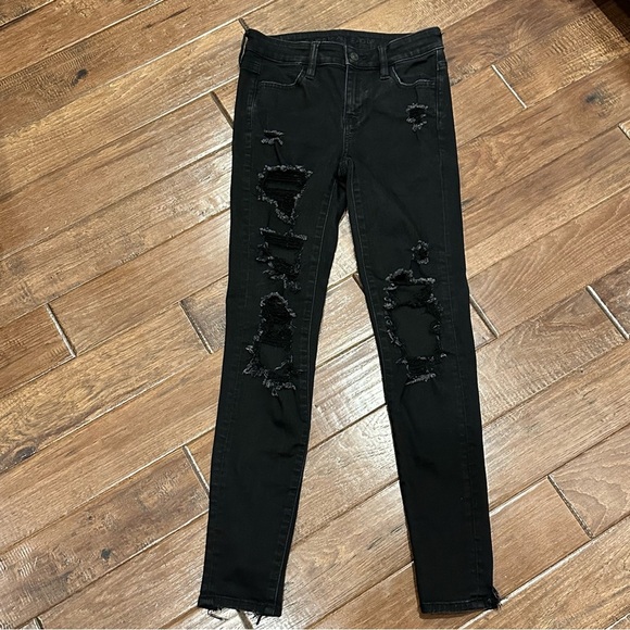 American Eagle Outfitters Denim - American Eagle Outfitters Next Level Stretch Distressed Black Jegging size 0